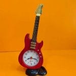 গিটার এলাম ঘড়ি , অনেক সুন্দর এলাম বাজে , টেবিল কিংবা ডেস্ক এ রাখতে পারবেন।