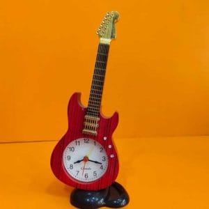 গিটার এলাম ঘড়ি , অনেক সুন্দর এলাম বাজে , টেবিল কিংবা ডেস্ক এ রাখতে পারবেন।