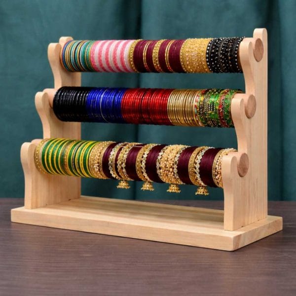 আপনার শখের চুড়ি গুলোকে সাজিয়ে রাখুন নান্দনিক কাঠের চুরির আলনায়।